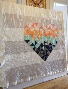 Piece and Love quilt deels gevuld met filler quilting