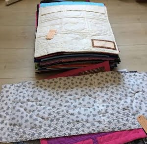 groeperen van de jubileumquilts op breedte