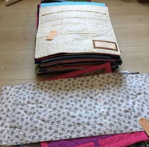 groeperen van de jubileumquilts op breedte